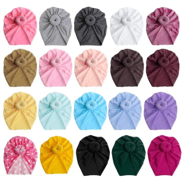 Bonnet doux pour bébé de couleur unie